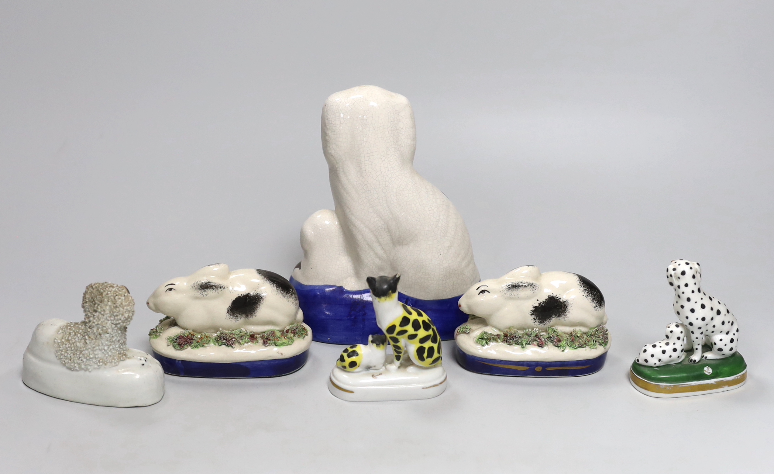 Six Staffordshire style flatback animals including three dogs, two rabbits and a cat group, tallest 15cm (6)